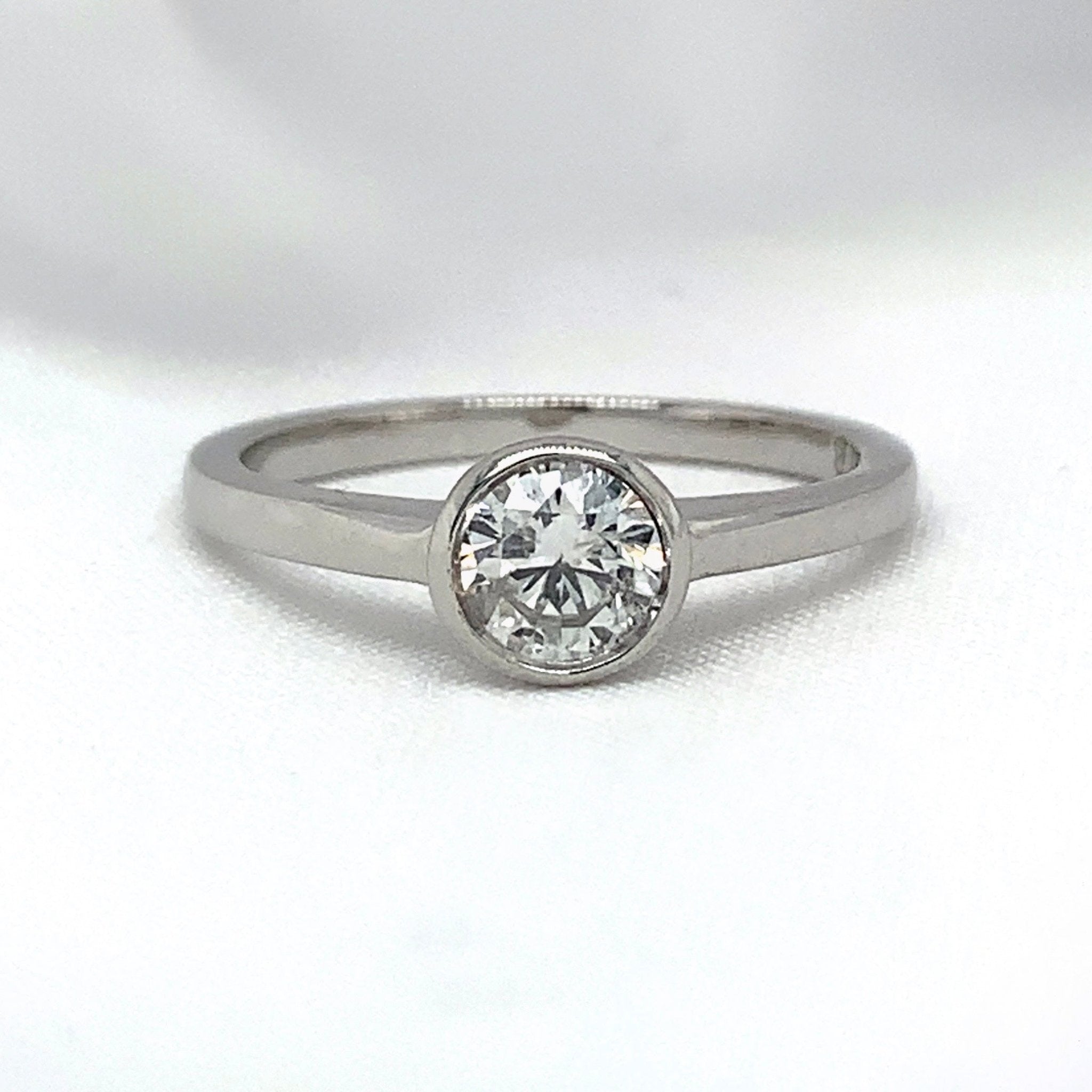 "Noémie" - Solitaire Round Brilliant Cut Diamond Engagement Ring in a Rubover Setting. - Engagement Ring - Ebony Jewellery Chichester - Bespoke by Ebony